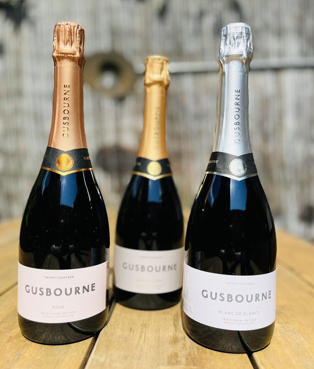 Three bottles of Gusbourne English sparkling wine — Rosé, Brut Reserve and
Blanc de Blancs — ready to toast the occasion